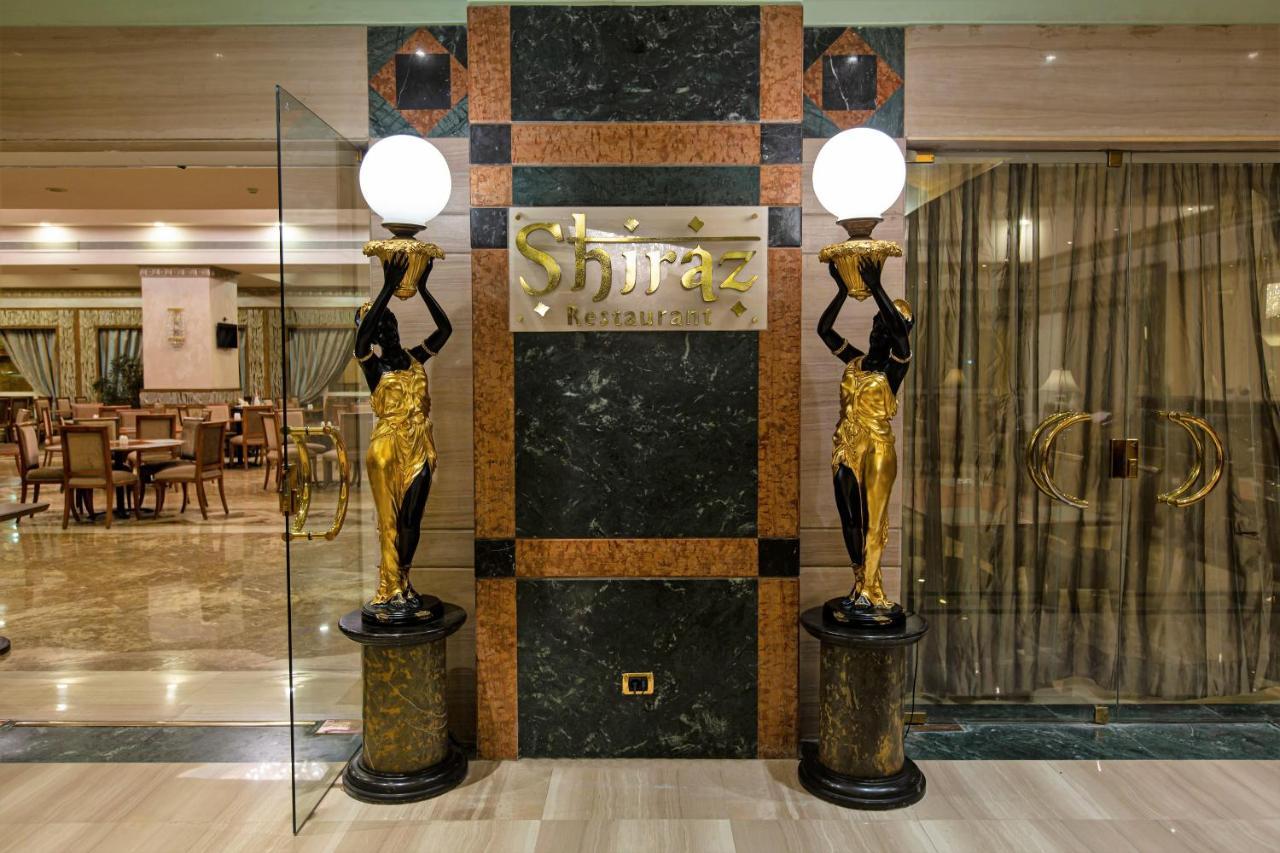 Triumph Plaza Hotel Kaherah Luaran gambar