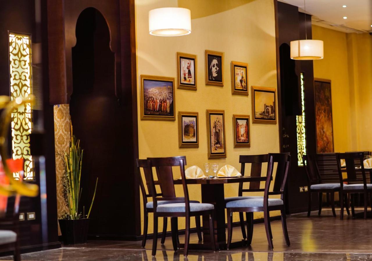Triumph Plaza Hotel Kaherah Luaran gambar
