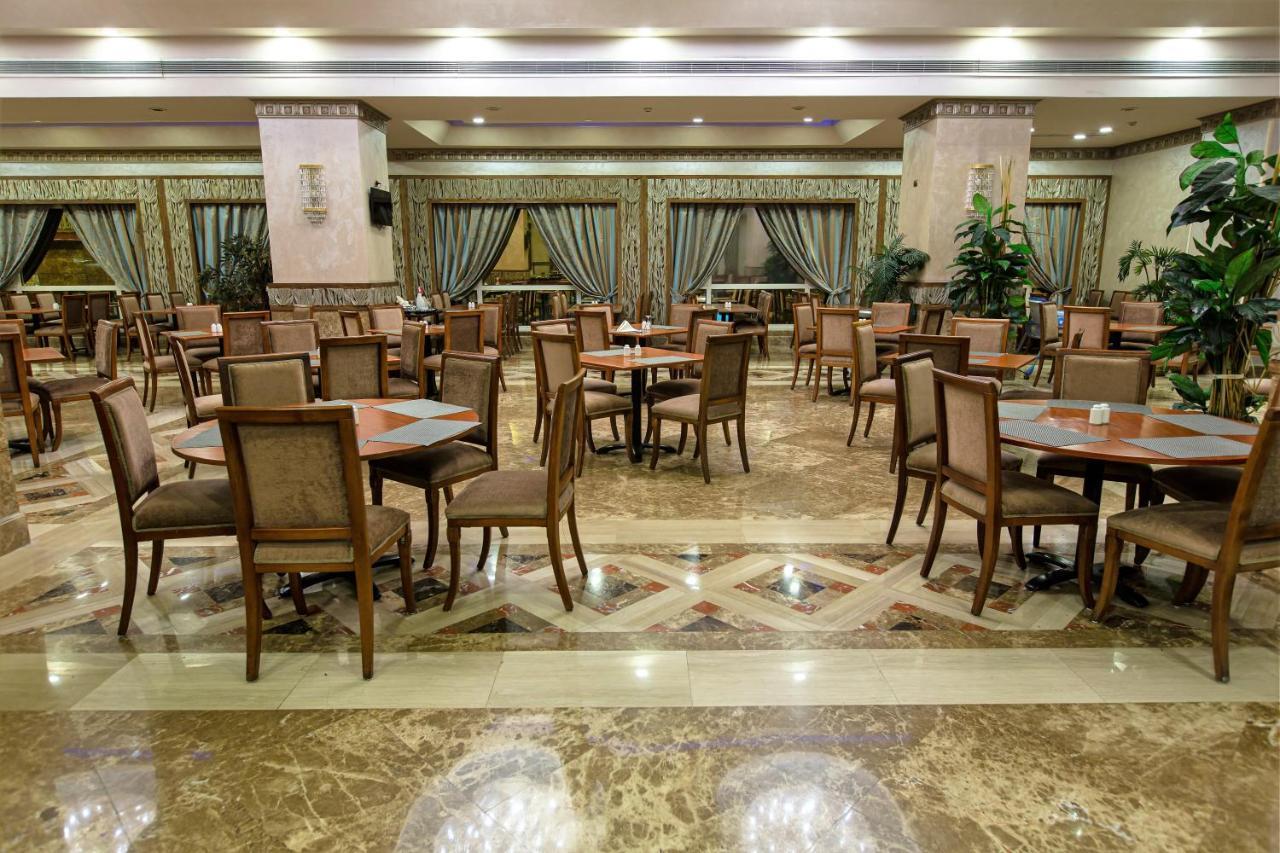 Triumph Plaza Hotel Kaherah Luaran gambar
