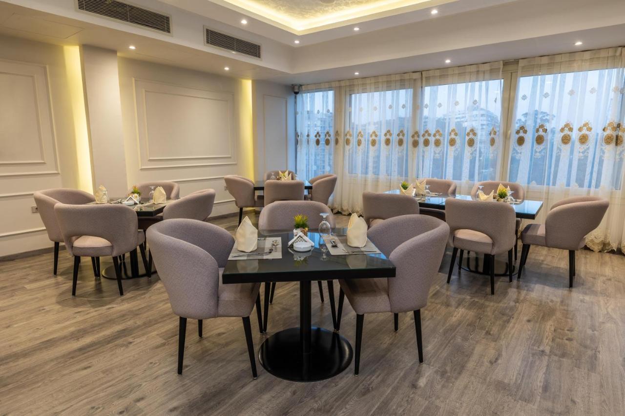 Triumph Plaza Hotel Kaherah Luaran gambar