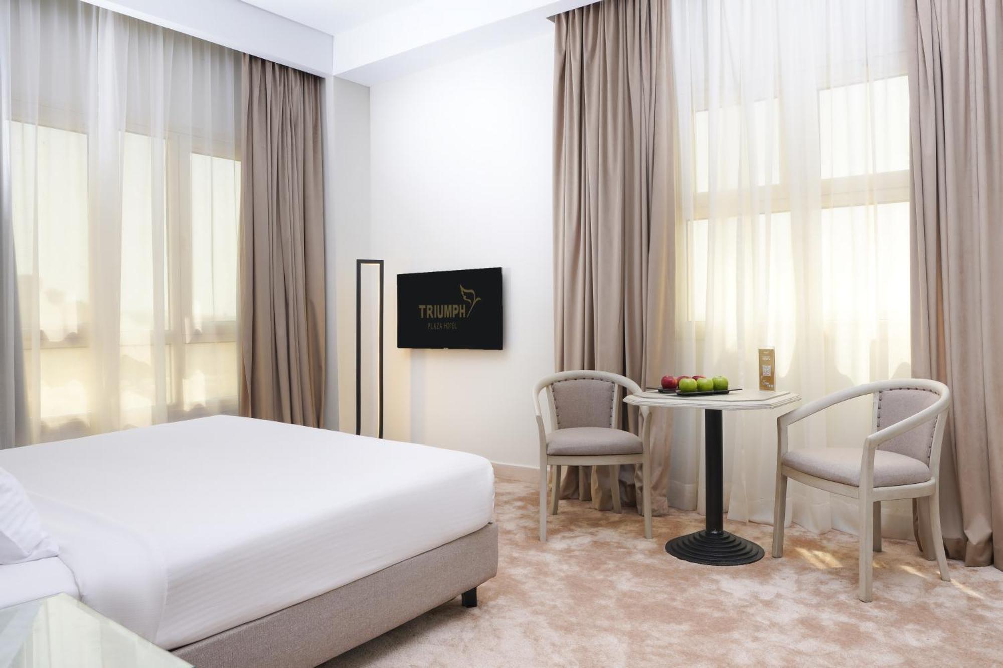 Triumph Plaza Hotel Kaherah Luaran gambar